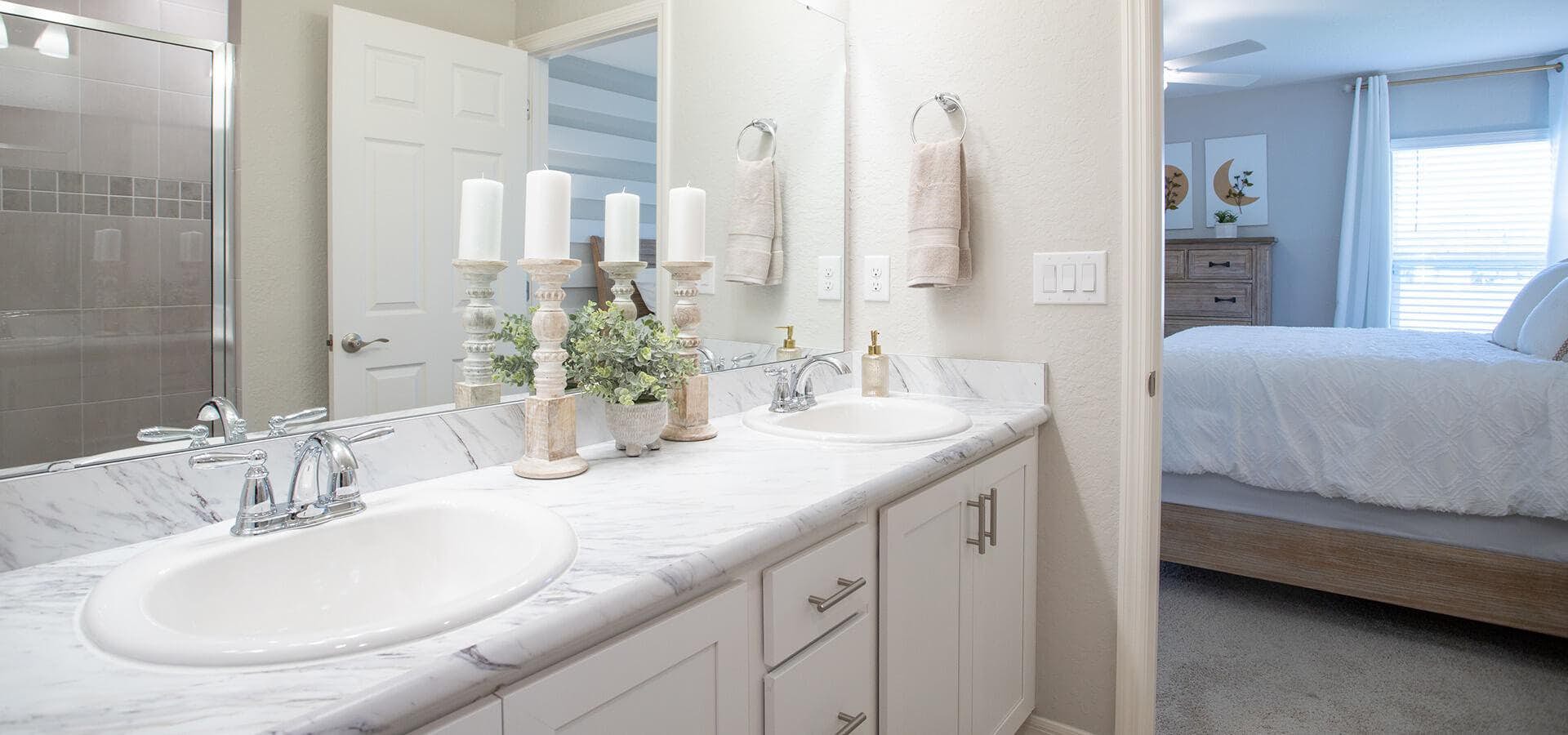 White bathroom decor in a Florida new home