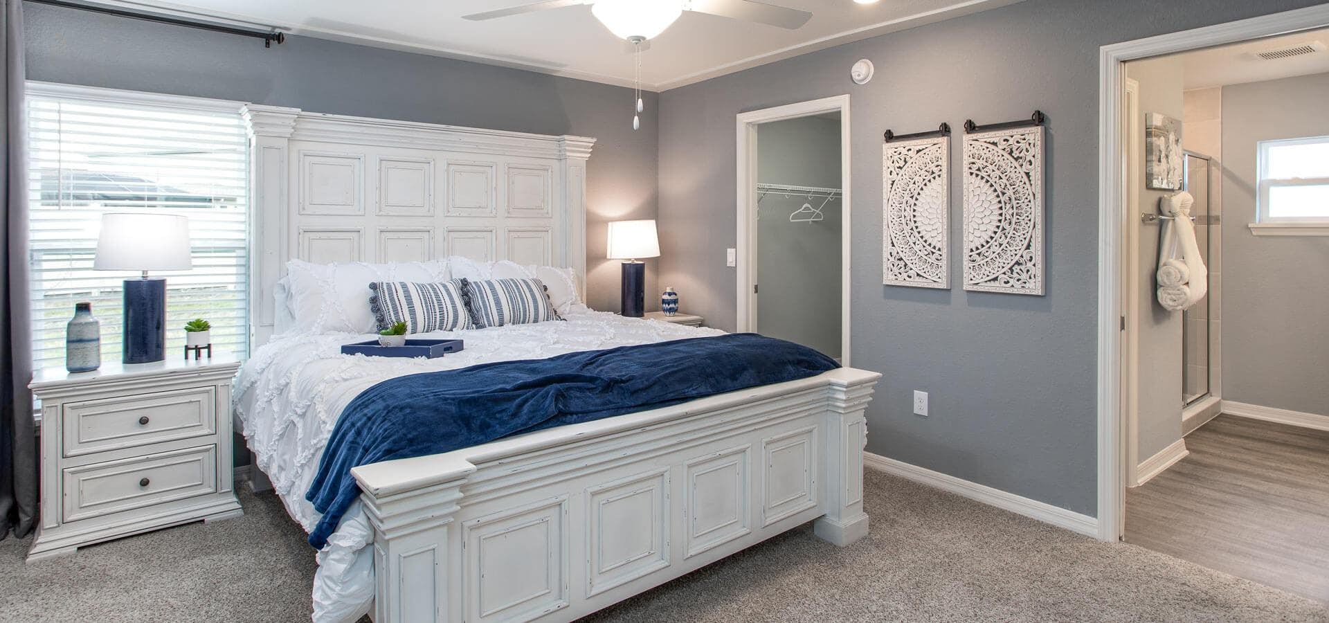 Soft blue-toned owner's suite