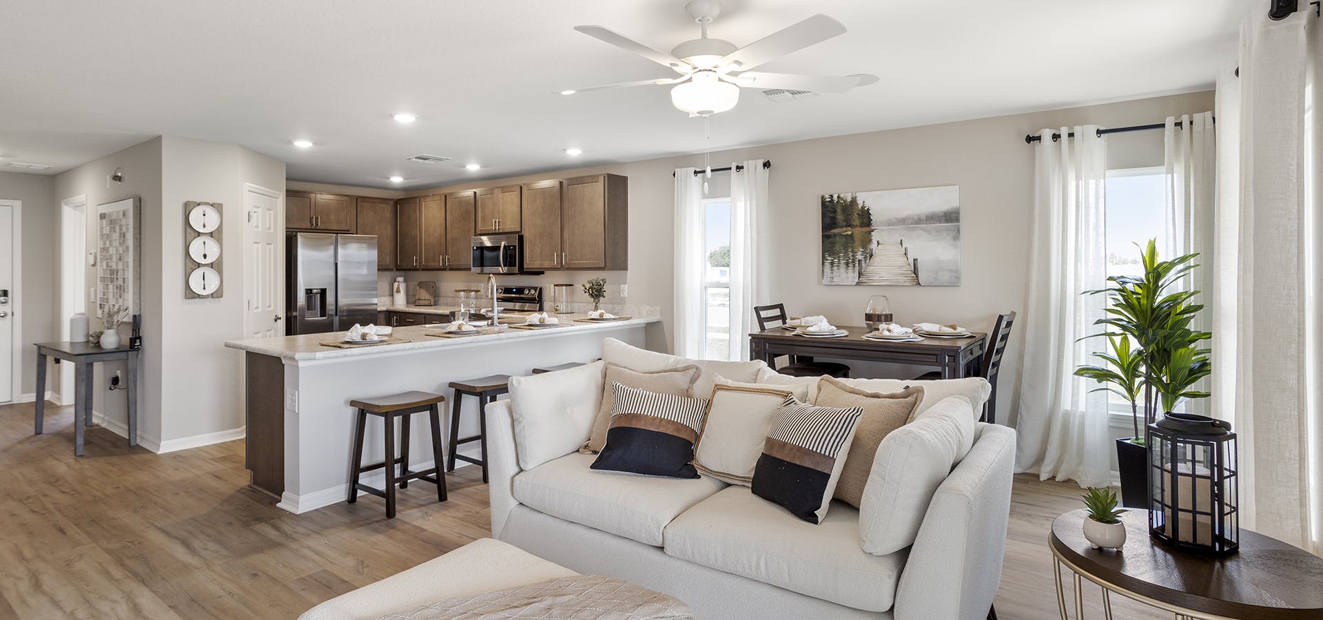 Living area of the Isla townhome by Highland Homes in Winter Haven, FL