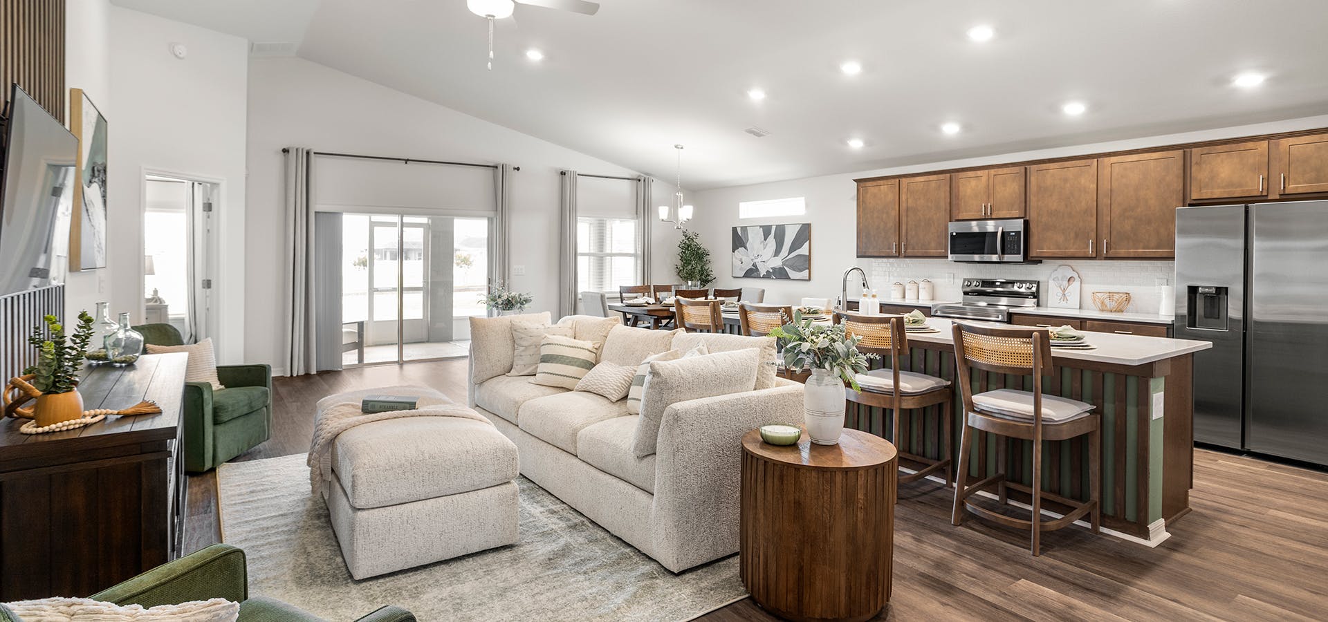 Light-filled, open living area with natural wood and light-colored furnishings