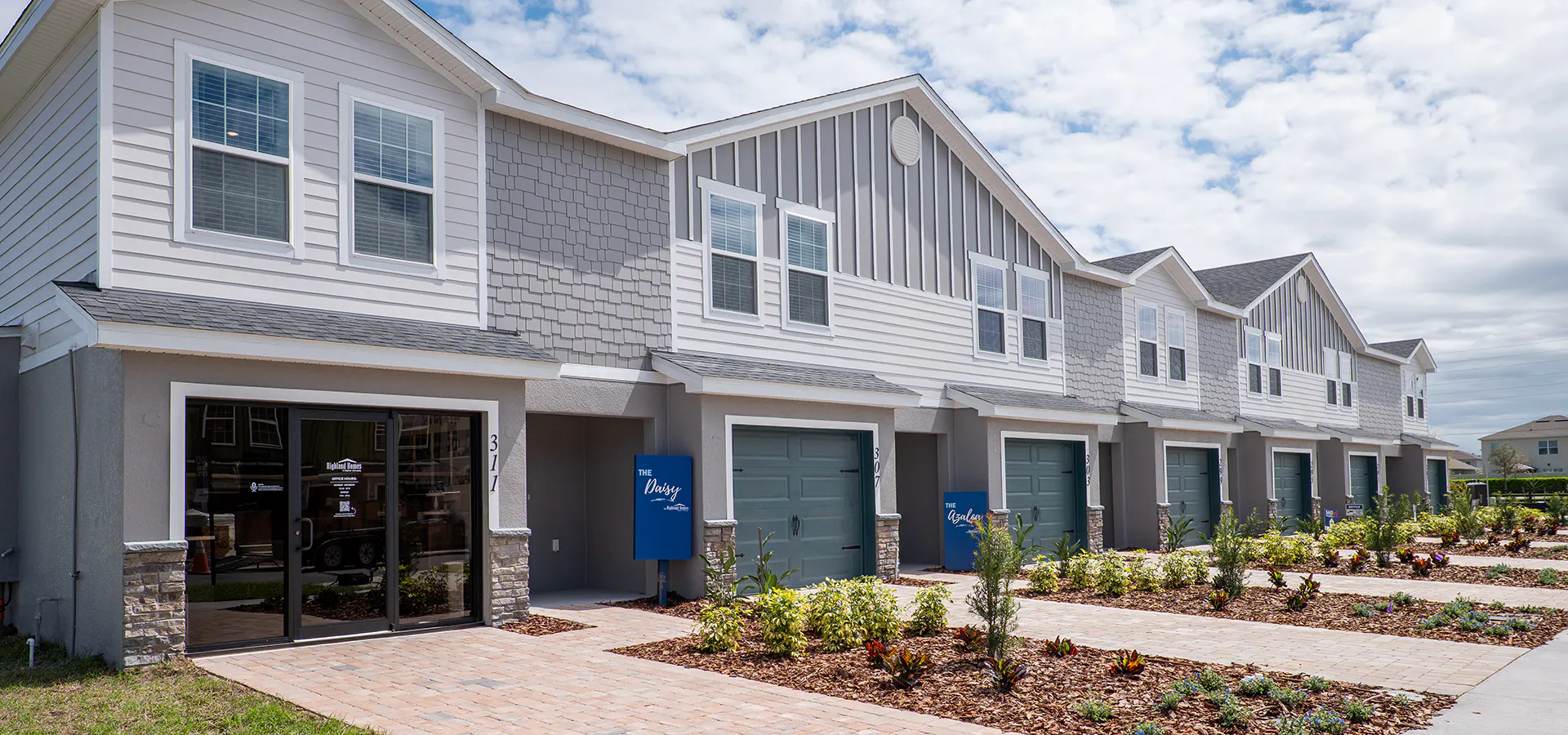 Exterior of new townhome models at Bridge Pointe in St. Cloud, FL