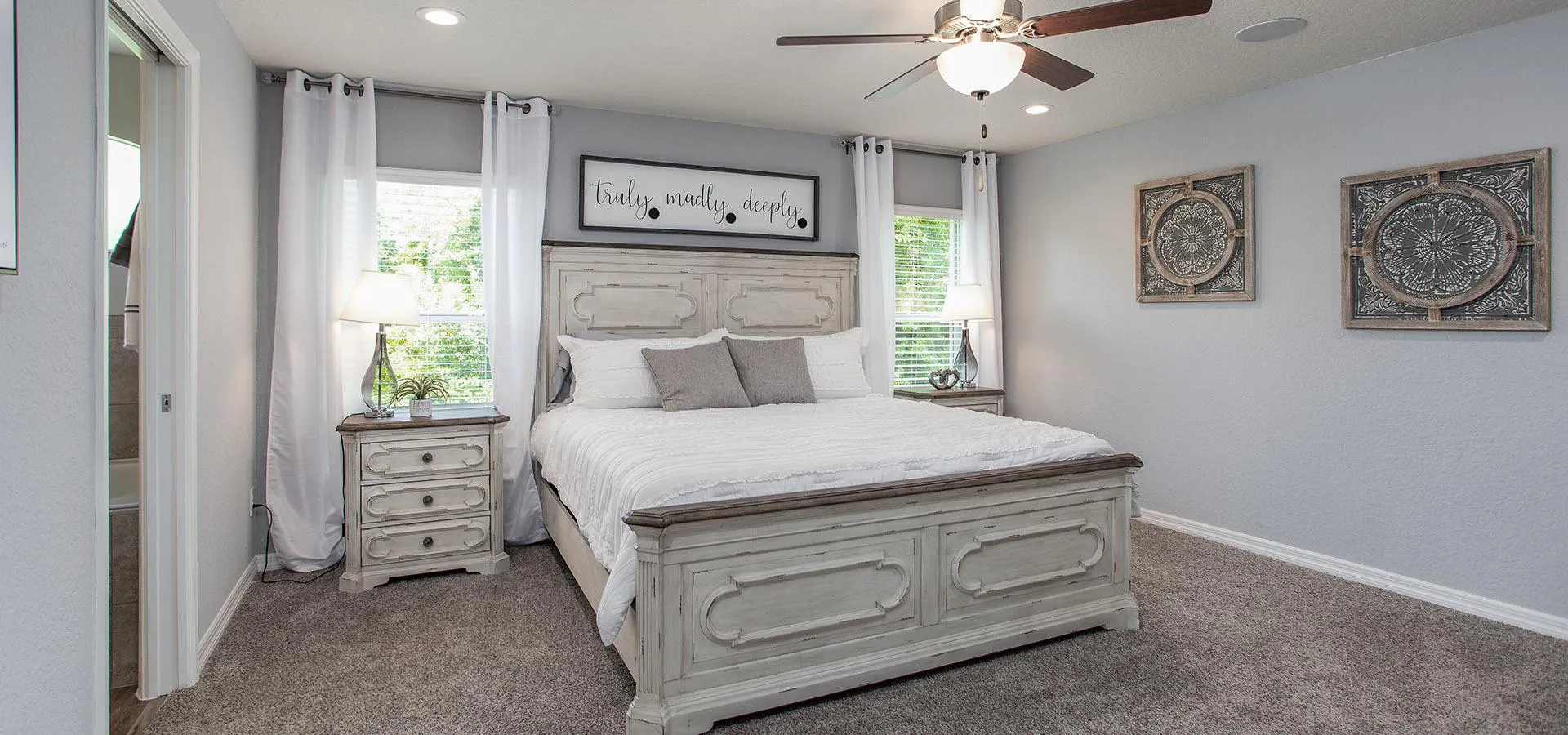 Cozy primary bedroom with en-suite bathroom