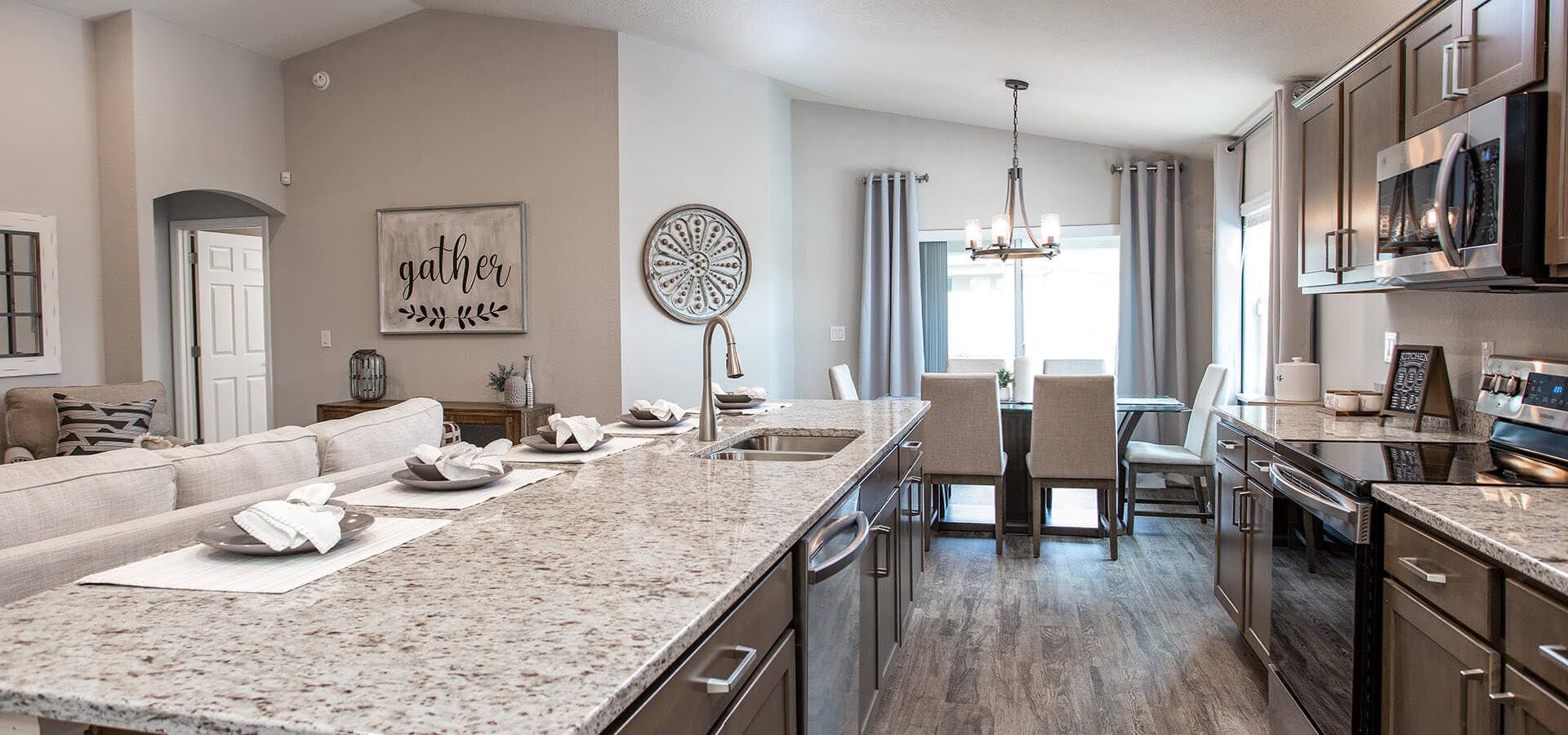 Kitchen and elegant dining area of the Parker new home floorplan