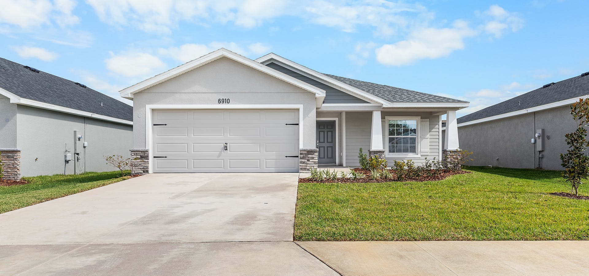 Craftsman style exterior of a new home by Highland Homes in Ocala
