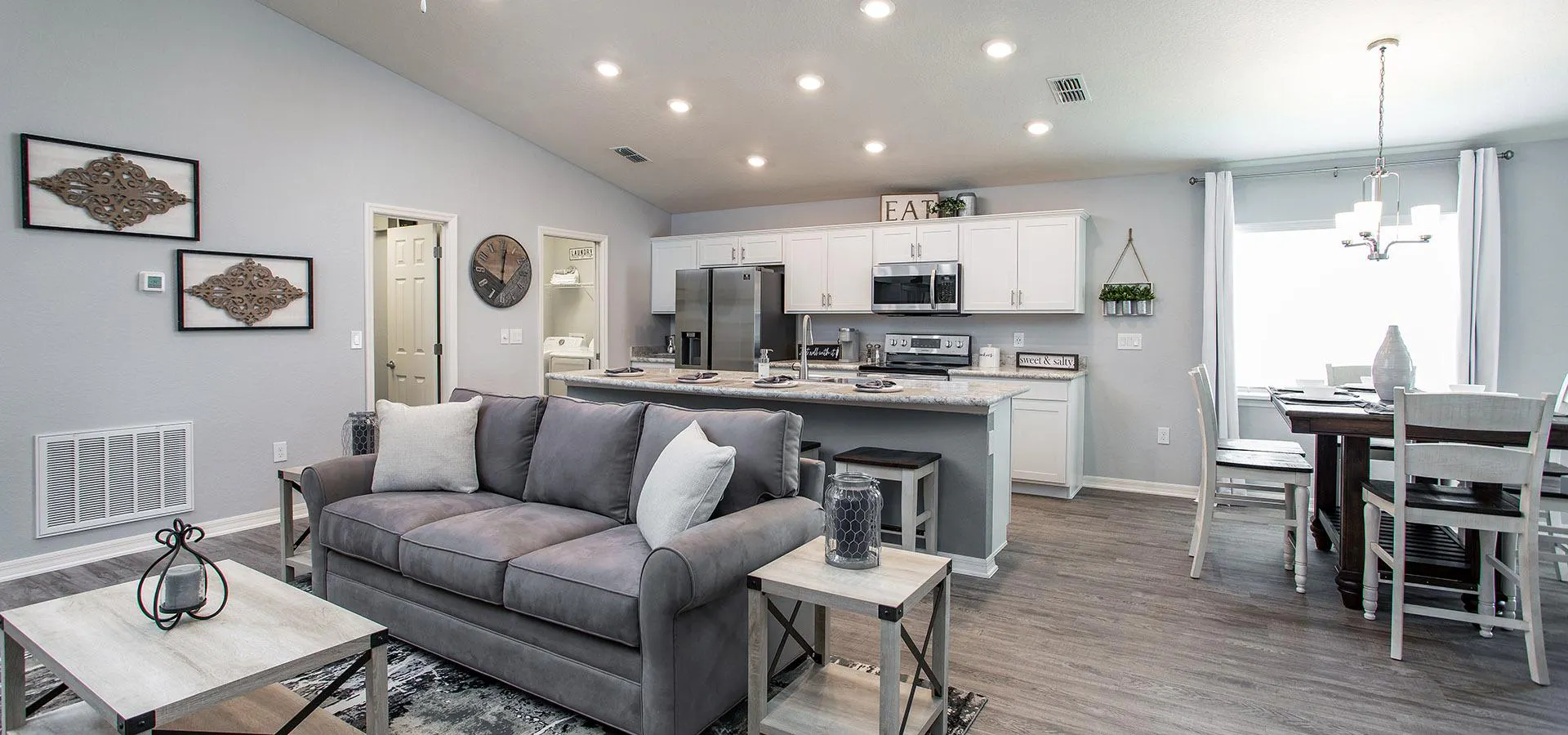 Large open living area under airy volume ceiling