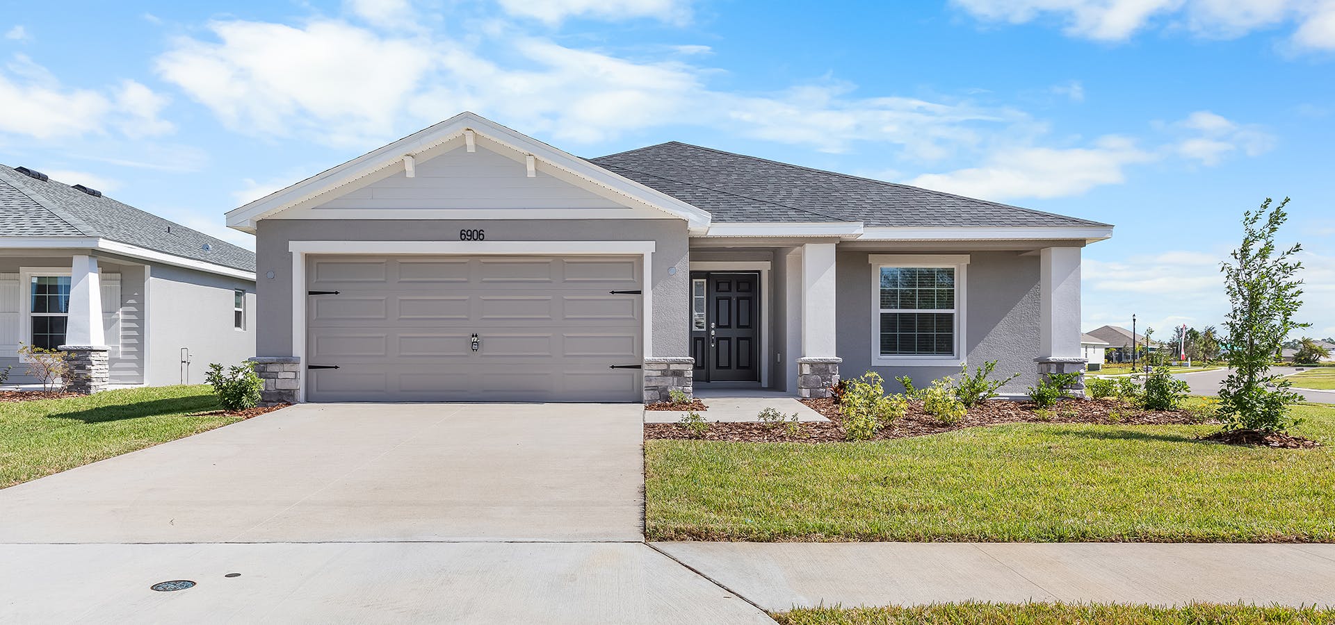 Exterior of the Raychel by Highland Homes, coming soon to Touchstone in Lakeland, FL