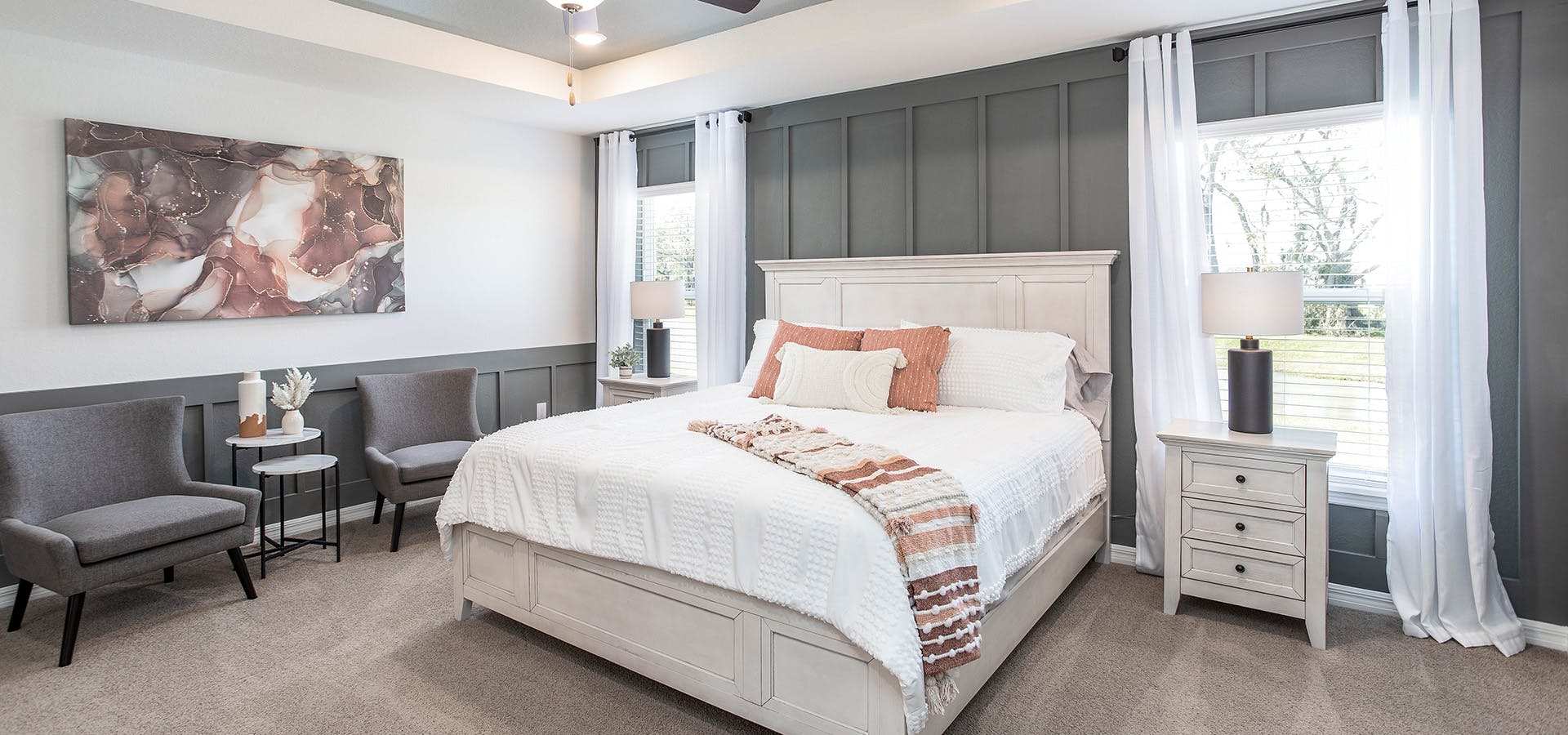 Grey and white bedrooms with coral accents