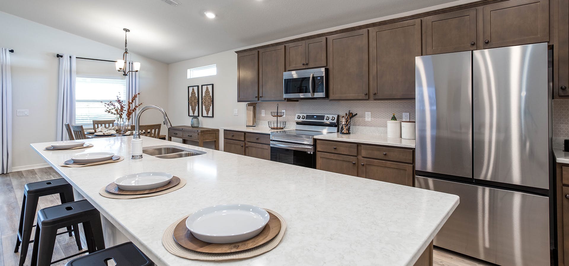 Kitchen with large island and quartz countertops