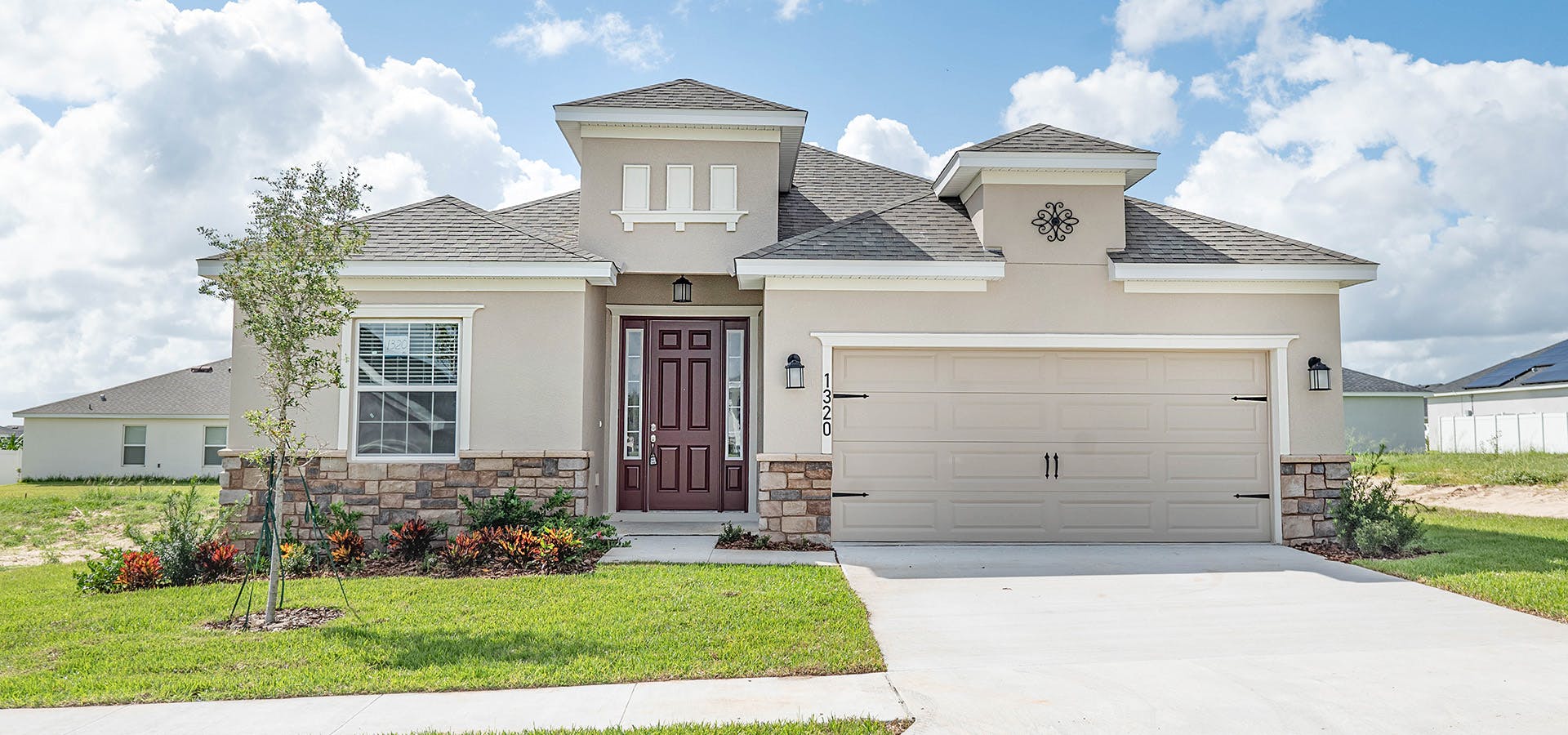 Highland Homes' Raychel exterior with stone fascia