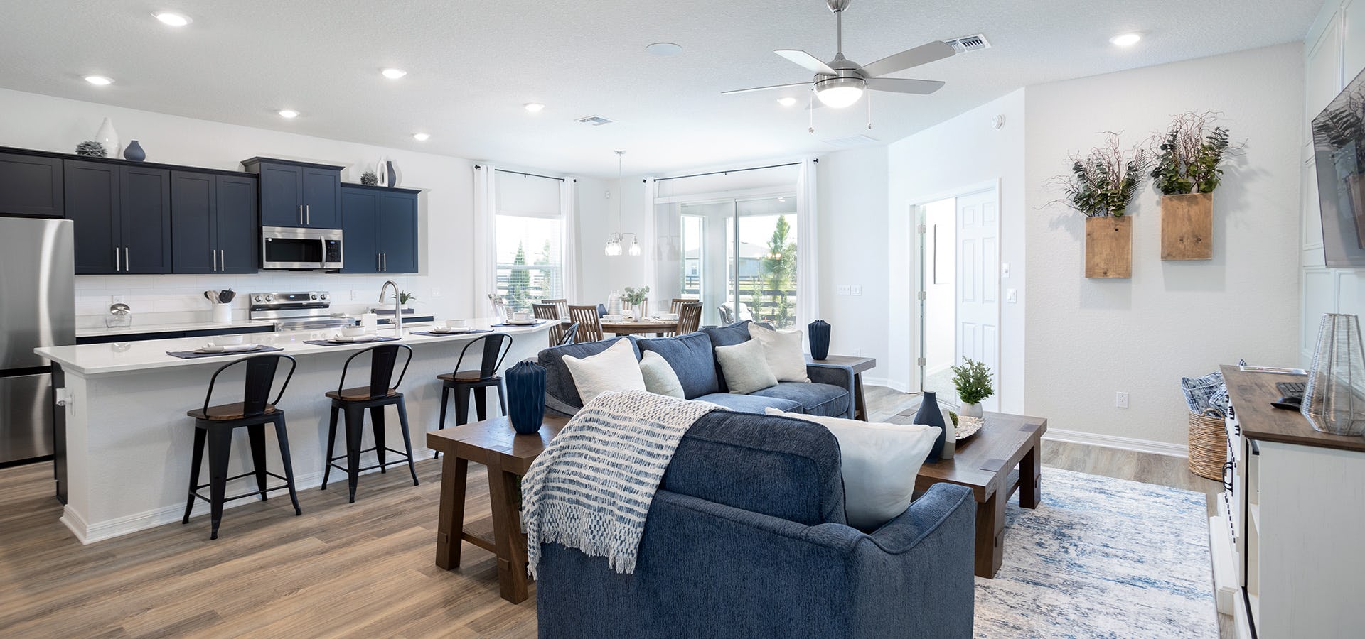 Sunny, open living area in a home offered by Highland Homes in Winter Haven, FL