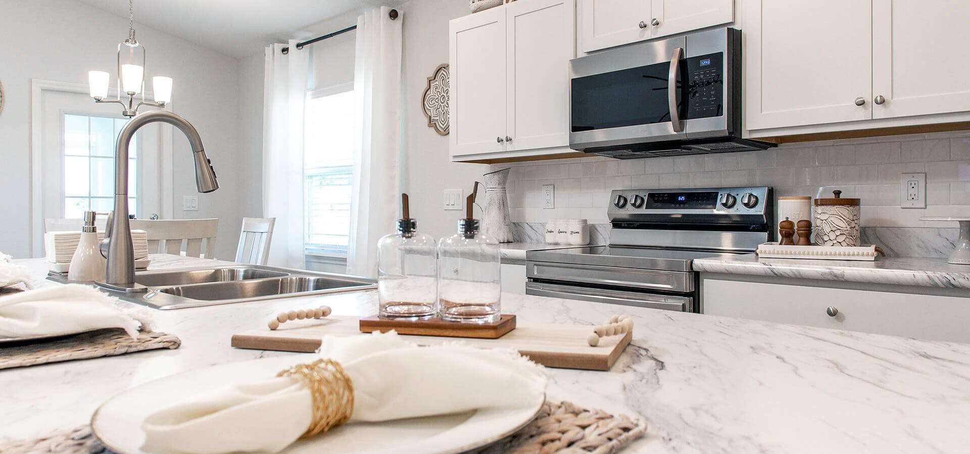 Clean white kitchen finishes in a Florida new construction home