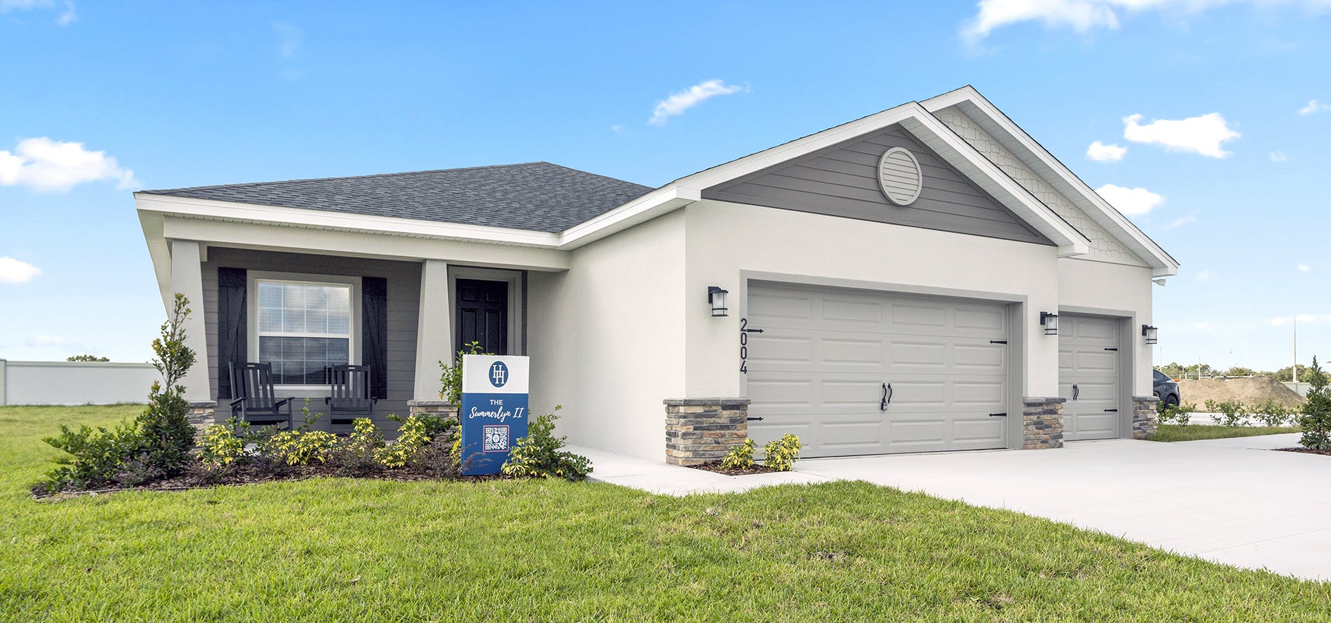 Craftsman style exterior of the Summerlyn II by Highland Homes in Florida