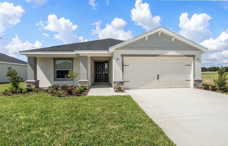 Raychel new home floor plan Crafstman-style exterior with a 2-car garage and front porch