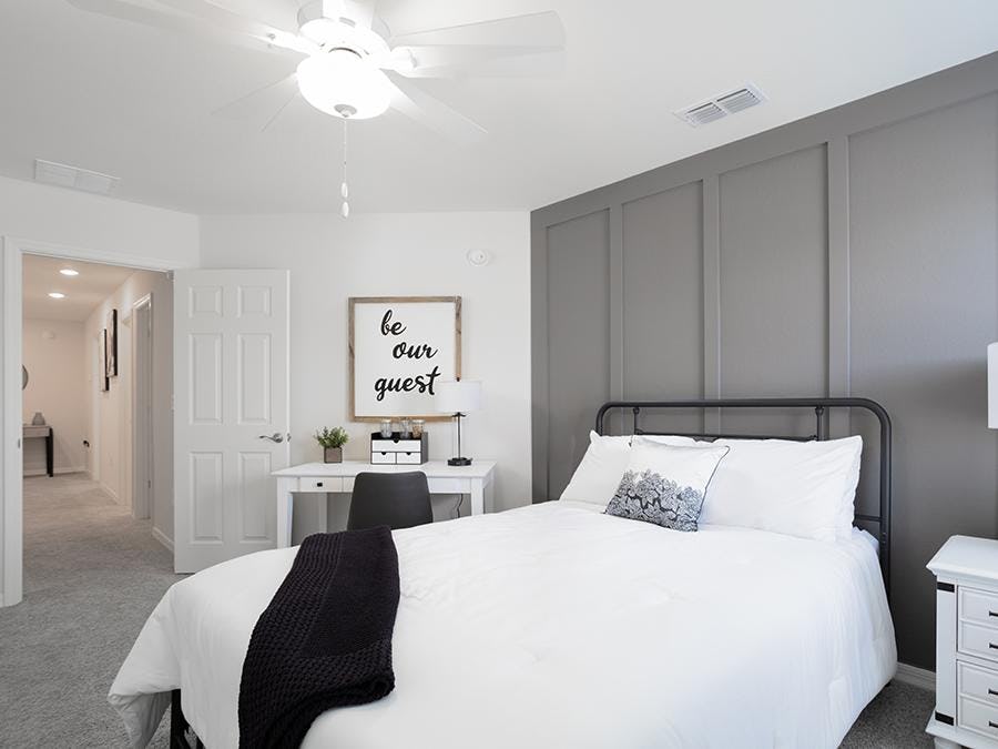 This guest bedroom is large enough to fit a queen-sized bed