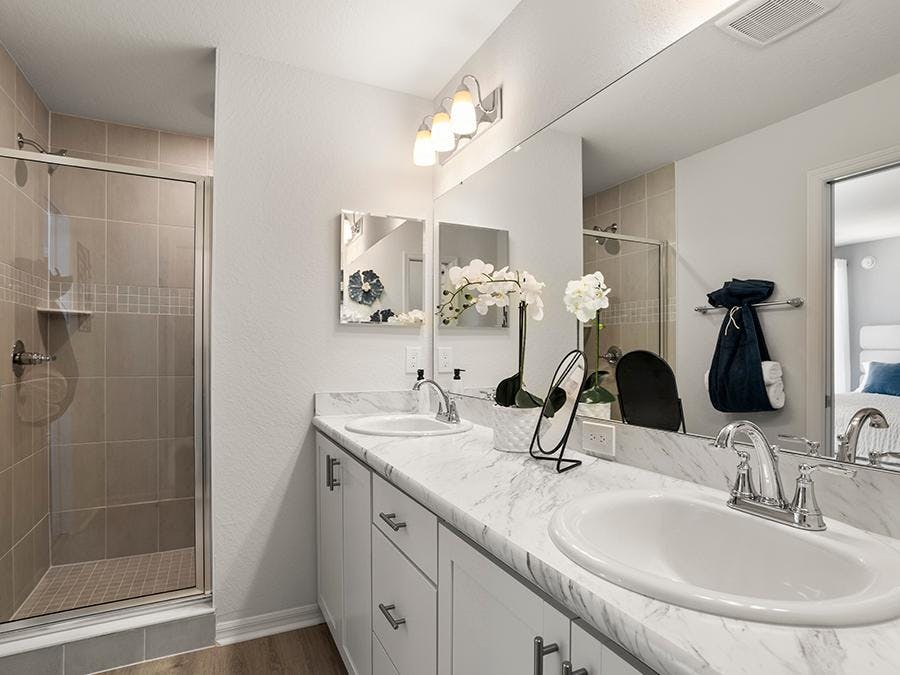 En-suite owner's bath in the Catalina model home at Harbor at Lake Henry in Winter Haven, FL