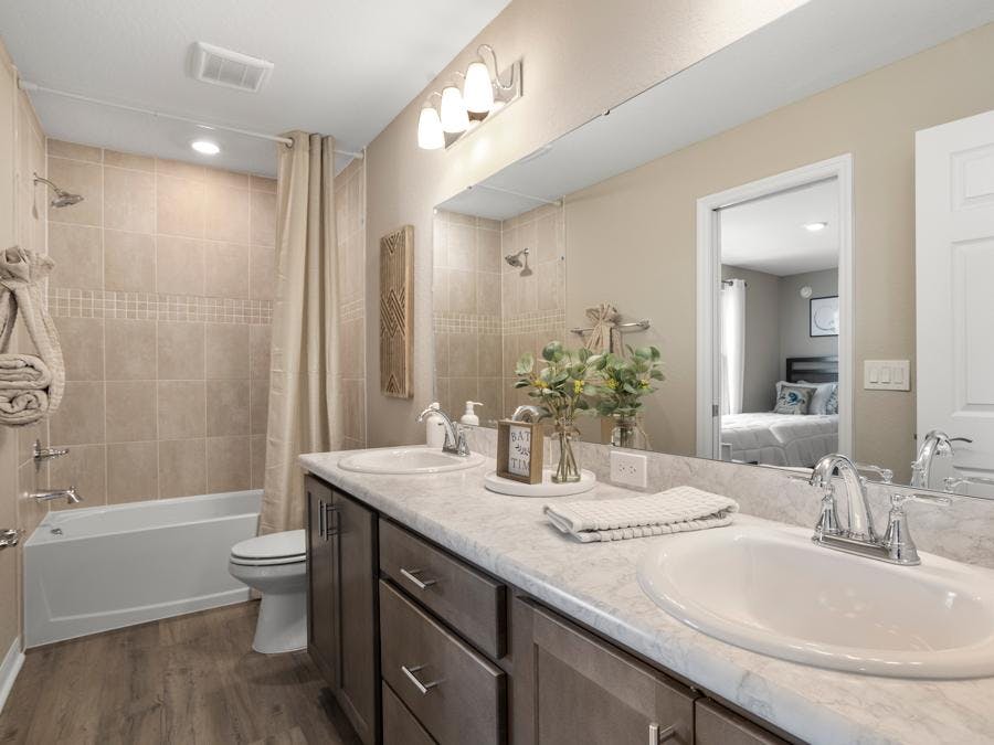 The Isla has a convenient Jack-and-Jill bath serving the secondary bedrooms.