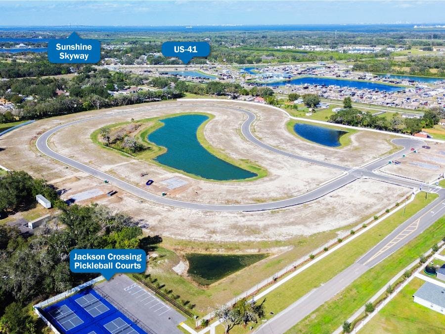 Aerial view of Jackson Crossing in Palmetto with the Sunshine Skyway in the background