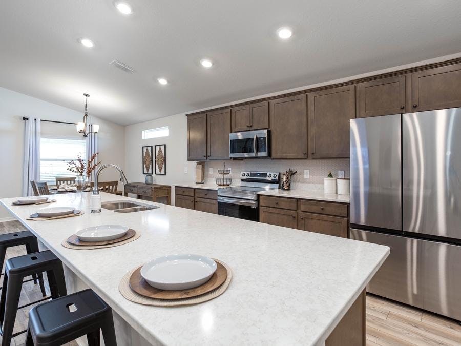 Kitchen in a new construction home at Aviary at Rutland Ranch