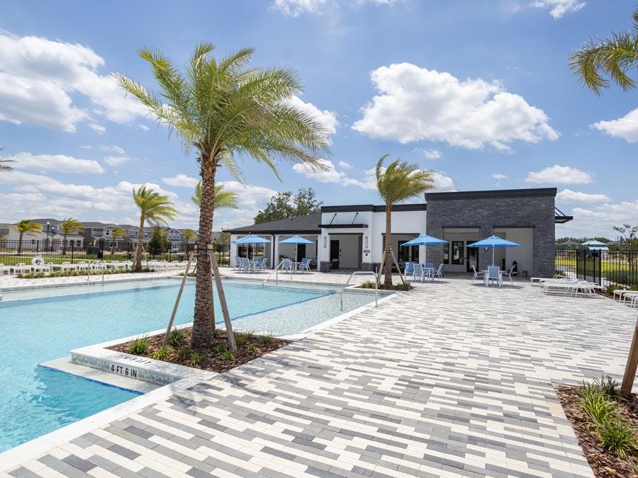 Pool amenity and clubhouse at The Crossings in St. Cloud, FL