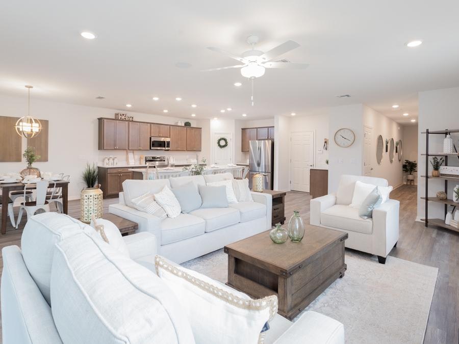 Cozy furtniture and modern features combine for an inviting living area in this Riverview model home