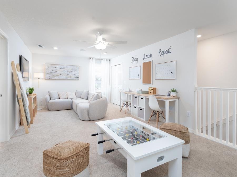 Flexible-use loft in the new Riverview model home by Highland Homes